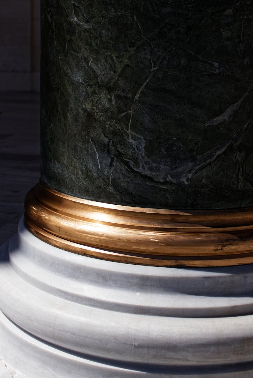 black brass colored and white pillar